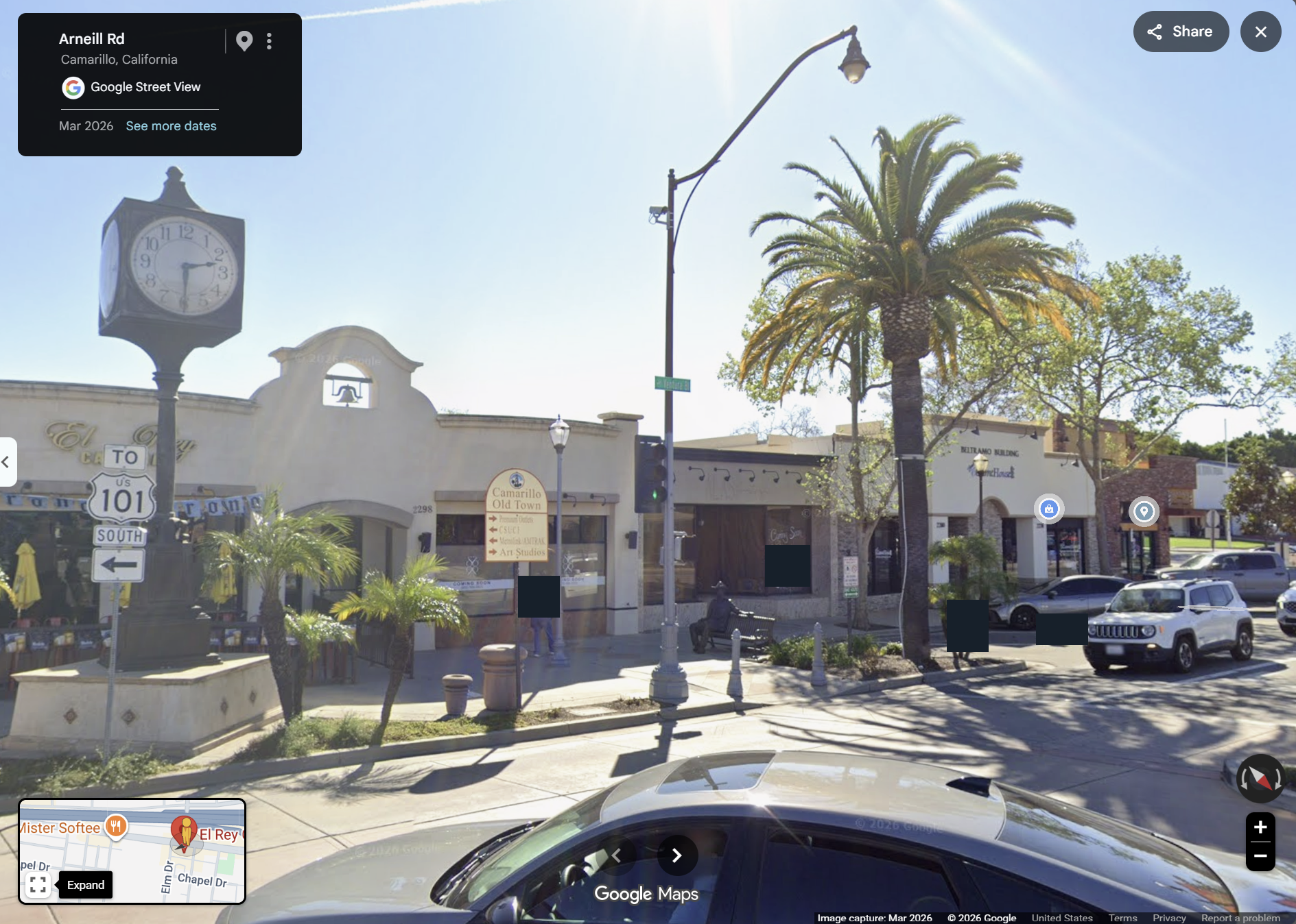 March 2026 Street View of the El Rey Cantina frontage beside the Old Town clock and streetlight poles. Incidental identifying details are masked; equipment types are unverified.