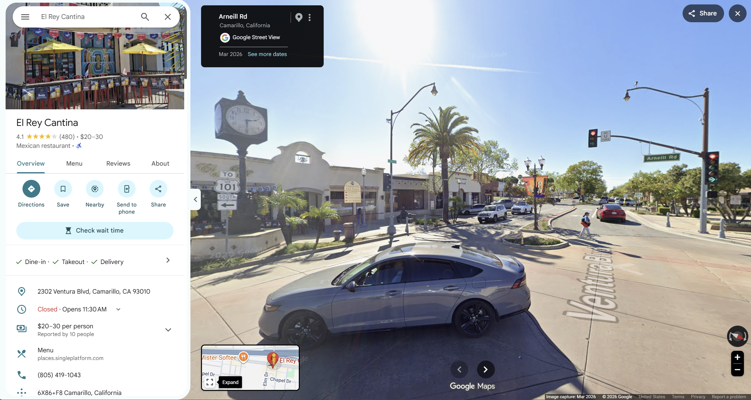 March 2026 Google Street View screenshot showing the El Rey frontage, clock, roadway and traffic signals at the Arneill Road junction.